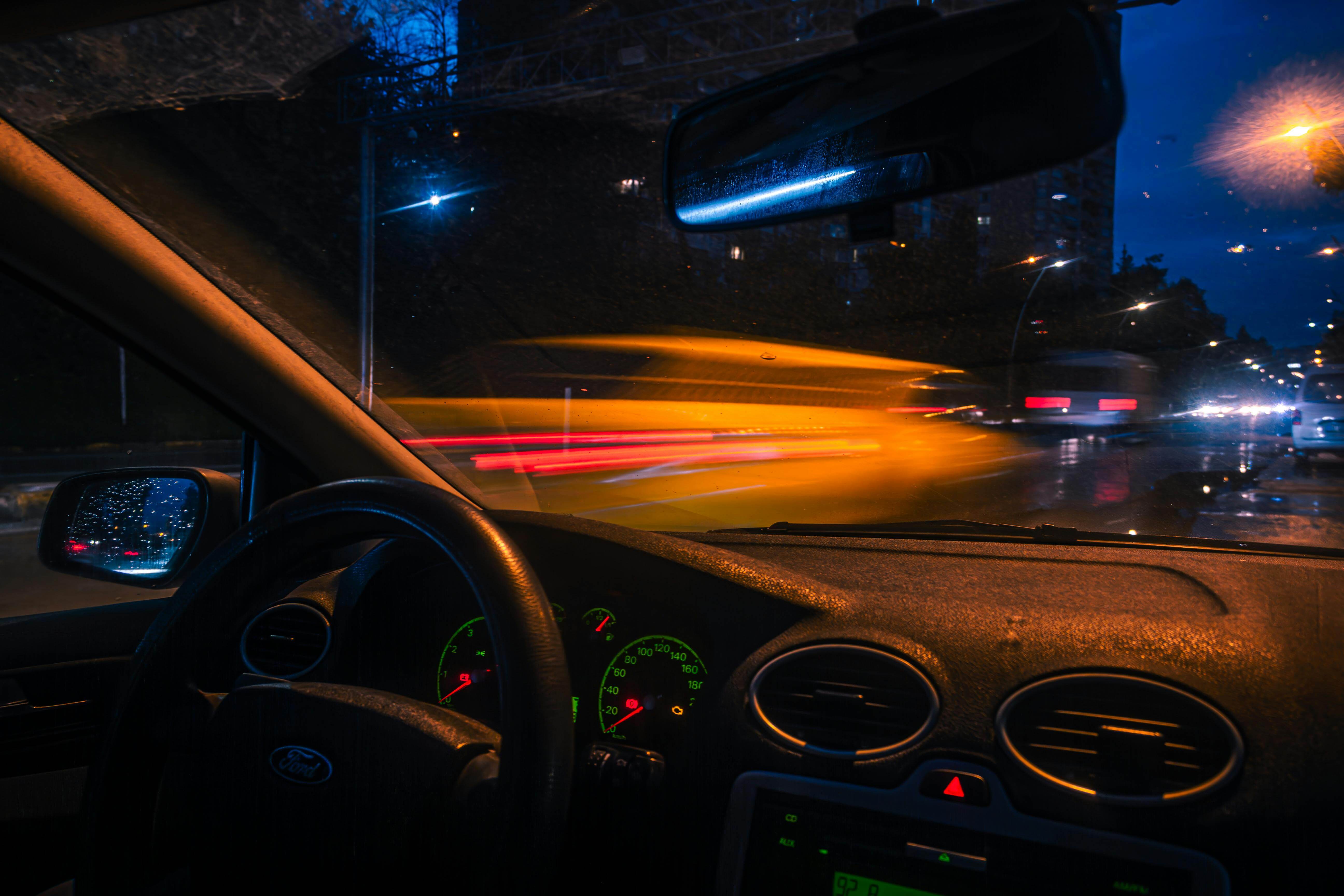 Car sputtering while driving at night dashboard view
